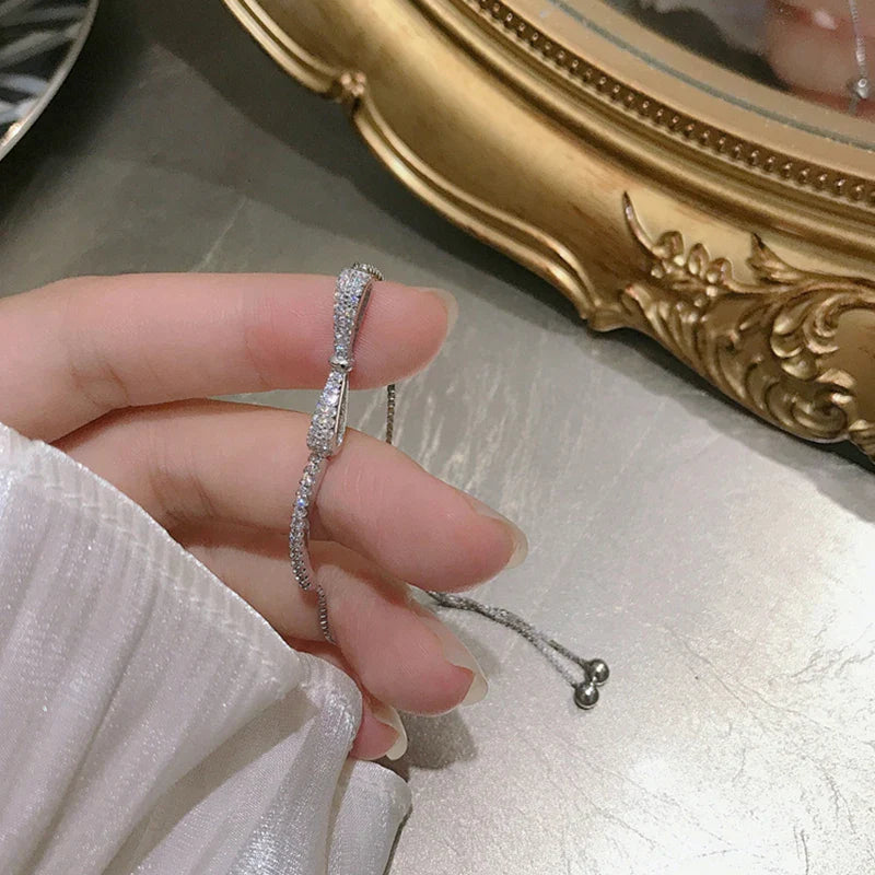 ANENJERY Hot Sale AAAAA Zircon Bow Bracelet Fashion Simple Adjustable Bracelet For Mother To Girlfriend Jewelry Gift Wholesale
