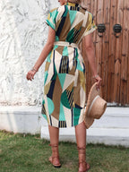 A Bat - Sleeved, Beled Dress with Geometric Patterns It's Suitable for Commuting in Spring and Summer, Featuring Elegant Style