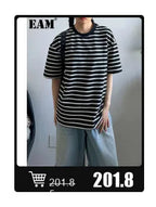 EAM 2024 New Fashion Winter Stand Collar Irregular Long Type Black Cotton-padded Clothes Loose Coat Black Jacket Woman YA771