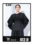 EAM 2024 New Fashion Winter Stand Collar Irregular Long Type Black Cotton-padded Clothes Loose Coat Black Jacket Woman YA771