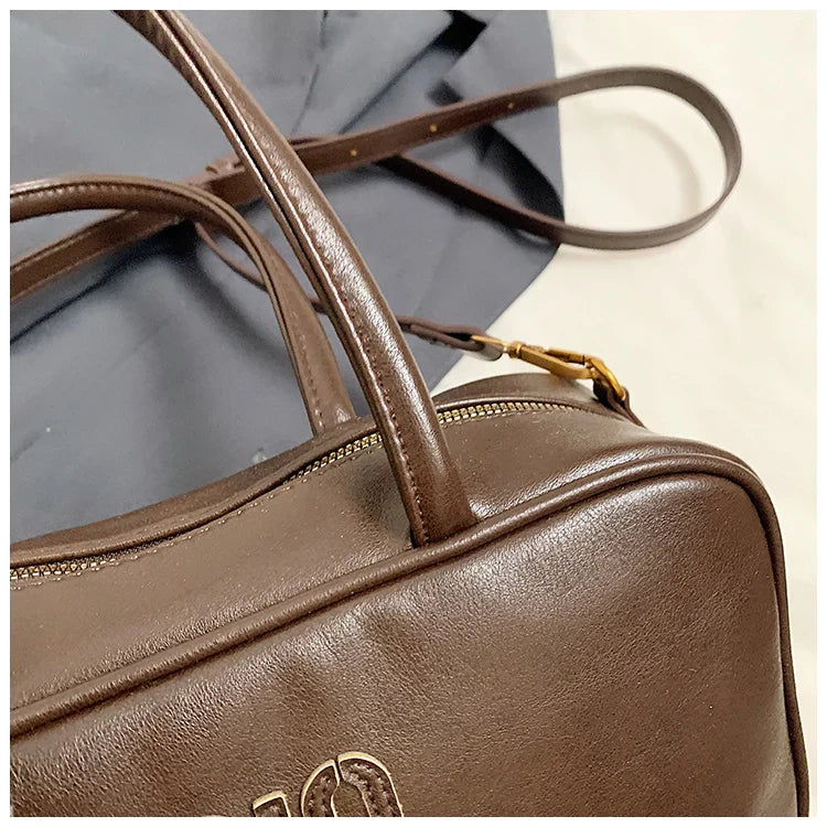 2025 new high-end luxury designer Boston handbag female niche retro fashion all-match pillow bag shoulder messenger bag trend