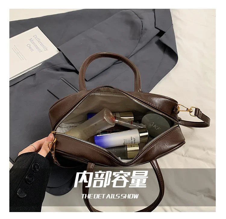 2025 new high-end luxury designer Boston handbag female niche retro fashion all-match pillow bag shoulder messenger bag trend