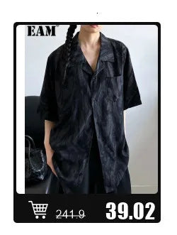 EAM 2024 New Fashion Winter Stand Collar Irregular Long Type Black Cotton-padded Clothes Loose Coat Black Jacket Woman YA771